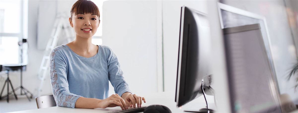 woman behind computer